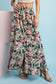 Floral printed maxi/midi skirt. Buttons down to midi length where is splits.